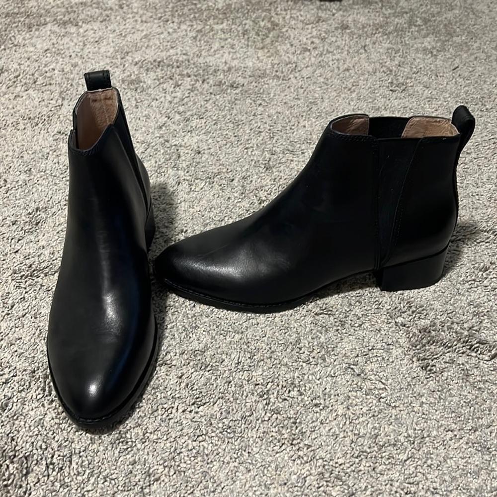 Black genuine leather booties.
